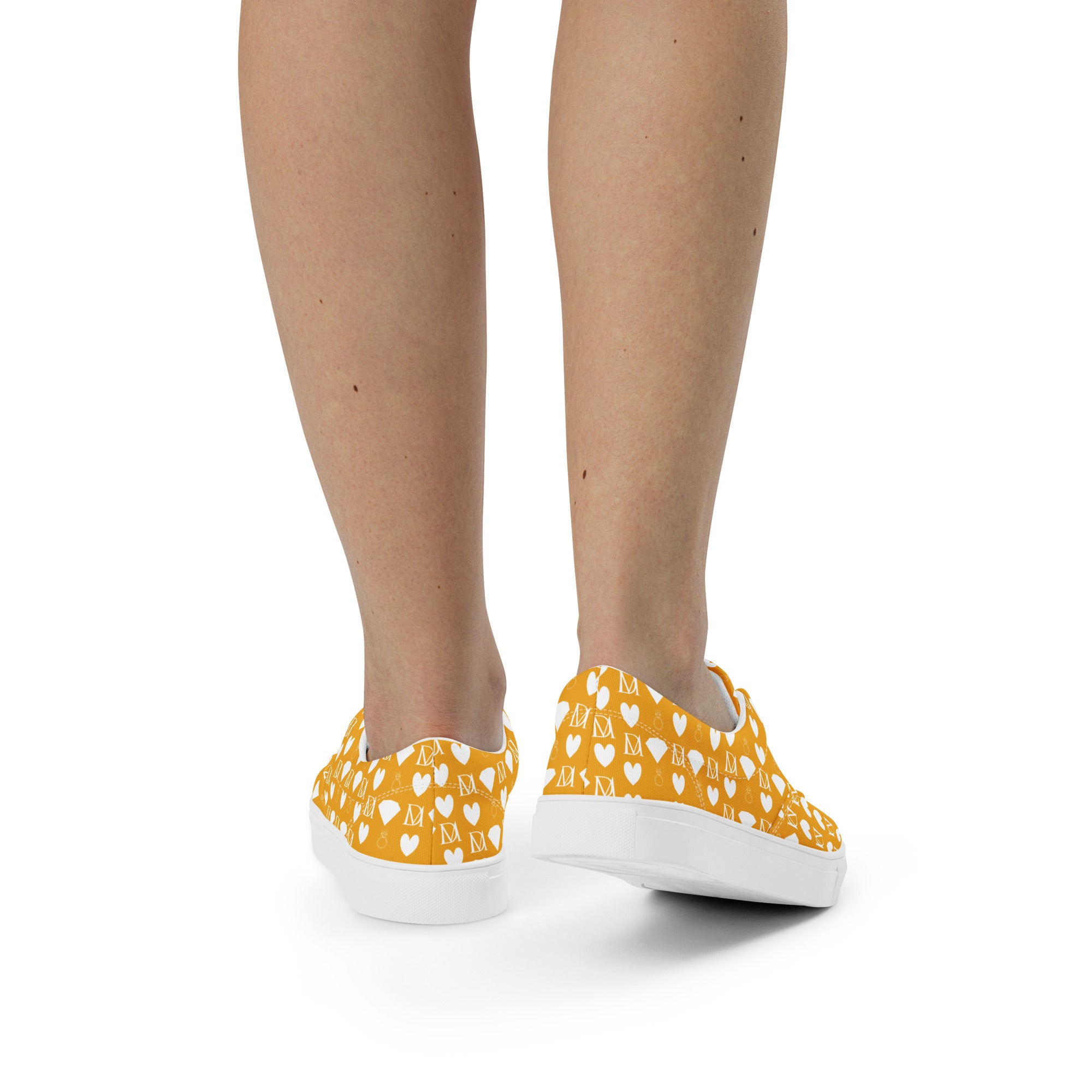 White lace-up canvas shoes for women featuring frosted diamond accents by Daemon Luxury.