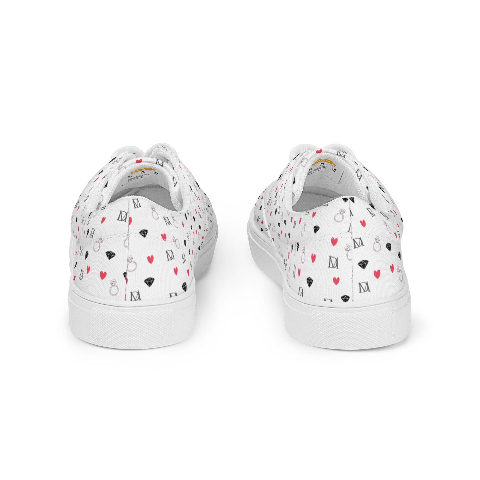 White lace-up canvas shoes featuring speckled diamond patterns from Daemon Luxury's Artica Blizzard Female collection.
