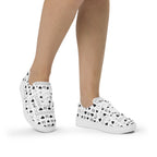 White lace-up canvas shoes for women from Daemon Luxury's Dim Diamonds Artica Blizzard collection, shown from the front.