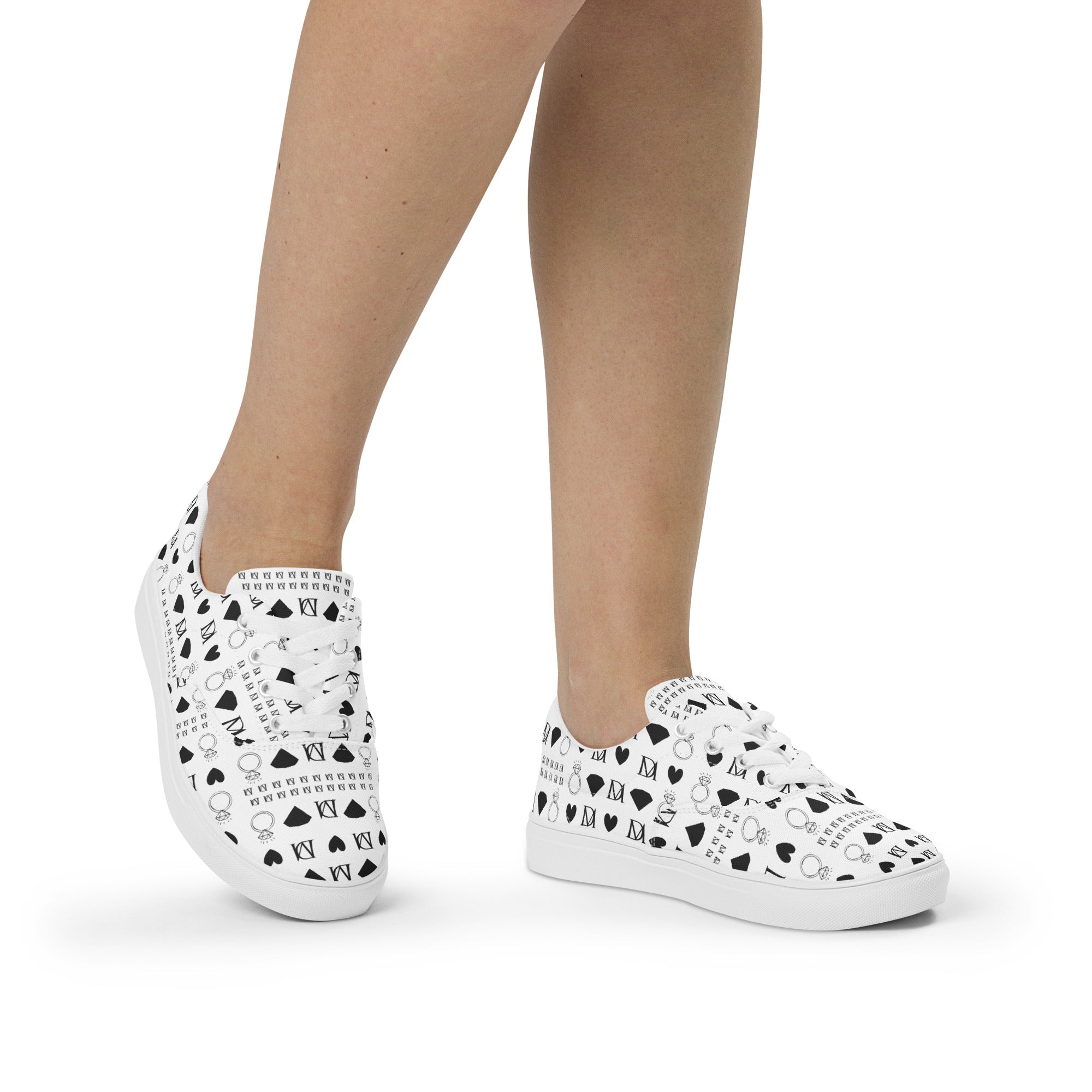 White lace-up canvas shoes for women from Daemon Luxury's Dim Diamonds Artica Blizzard collection, shown from the front.