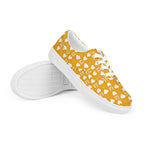 White lace-up canvas shoes for women featuring frosted diamonds design by Daemon Luxury, shown from the front right angle.
