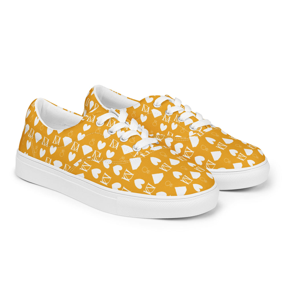 White lace-up canvas shoes for women featuring frosted diamond details by Daemon Luxury, shown from the front right side.