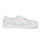 White lace-up canvas shoes featuring speckled diamond patterns from Daemon Luxury's Artica Blizzard female collection.